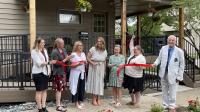 A ribbon cutting ceremony was held on May 28 for Cardinal Housing Network's first transitional home for women in recovery.
