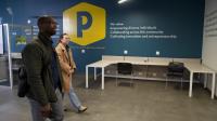 Michael Odupitan and Jessica Pauly, of Omni Circle, tour Peaslee Tech
