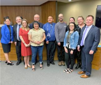 Tim Shoulderblade, center, is pictured during his Drug Court graduation ceremony.