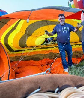 Douglas County IT employee Darrin Harrison inflates his hot air balloon.