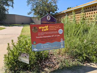 World Cafe Yard Sign in front of Stidham Hall at Haskell Indian Nations University