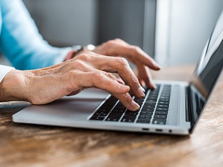 Hands on laptop