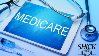 White tablet with blue background and medical paraphenalia